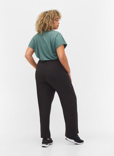 Viscose workout trousers with pockets, Black, Model image number 1