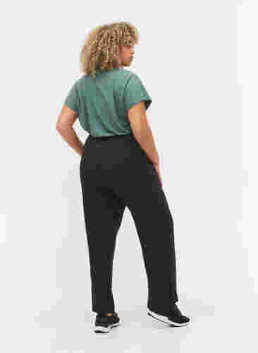 Viscose workout trousers with pockets, Black, Model image number 1