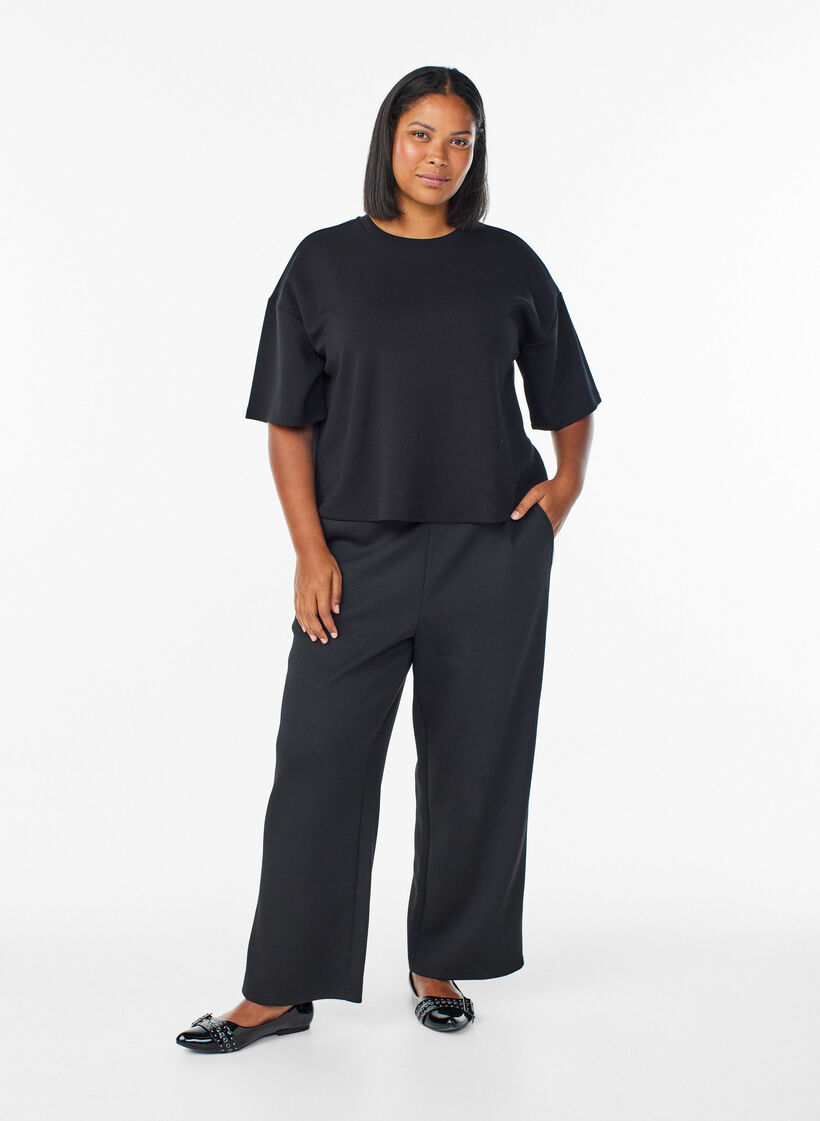 Short loose-fit t-shirt in a modal blend, Black, Model image number 1