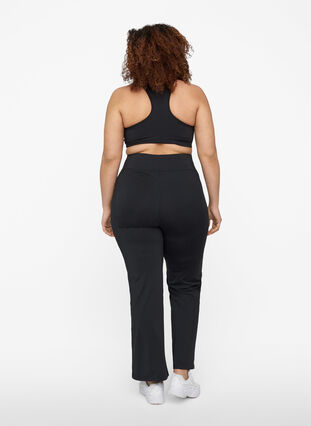 Flared exercise trousers with stretch, Black, Model image number 1