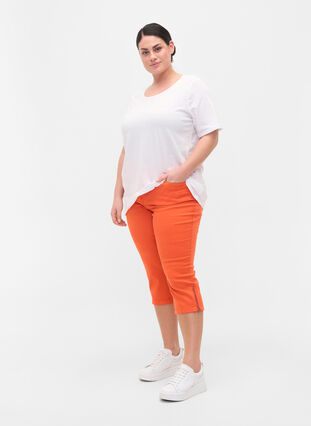 Close-fitting capris with zip, Orange , Model image number 2