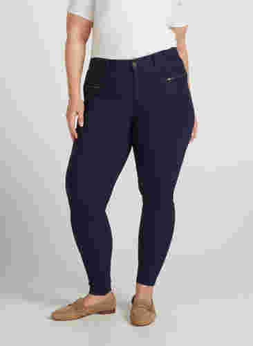 Close-fitting trousers with zip details, Night Sky, Model image number 1