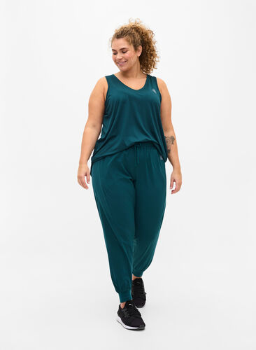 Loose exercise trousers with pockets, Deep Teal, Model image number 0