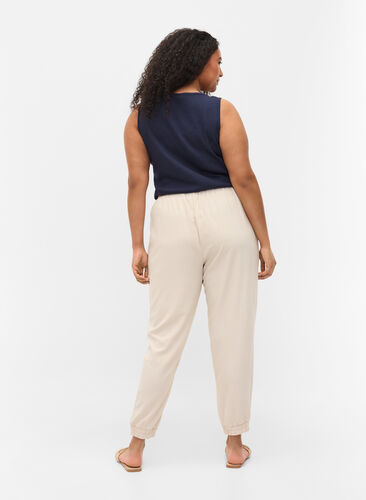 Trousers with pockets and elasticated trim, Warm Sand, Model image number 1