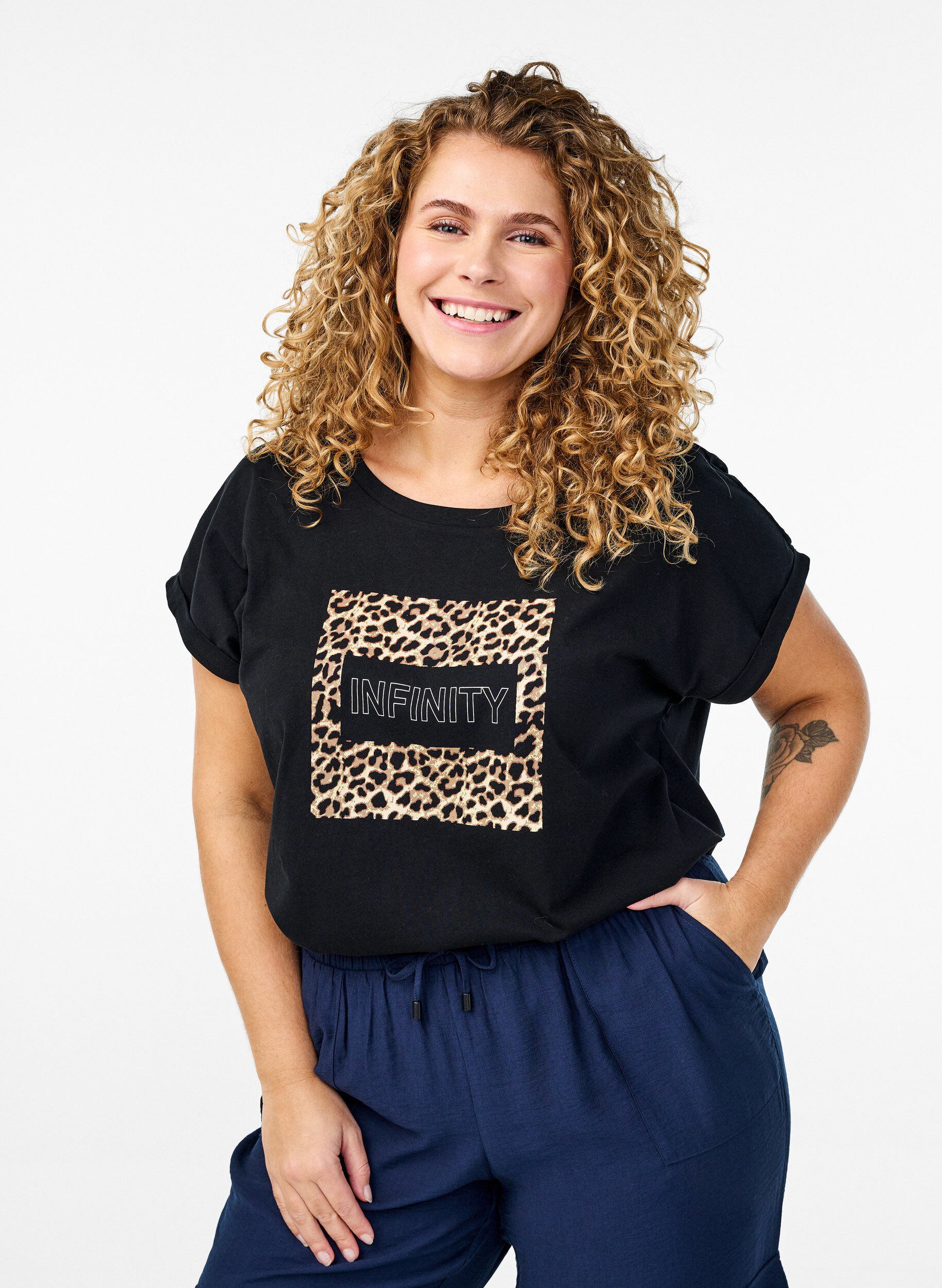 T-shirt with leopard print and text