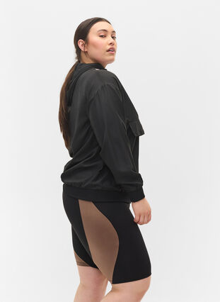 Tight fitted training shorts, Black w. Deep Taupe, Model image number 2