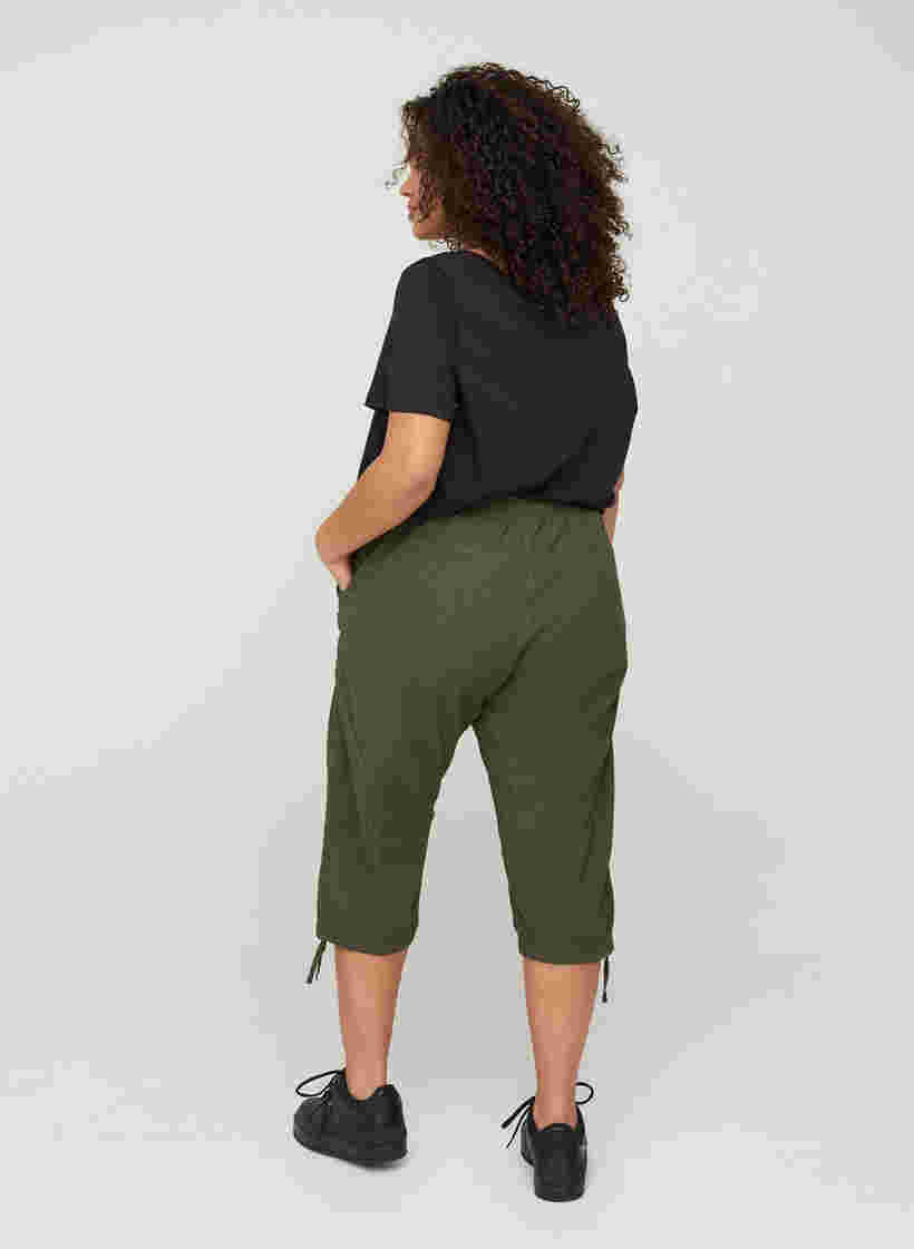 Loose cropped trousers in cotton, Ivy Green, Model image number 1