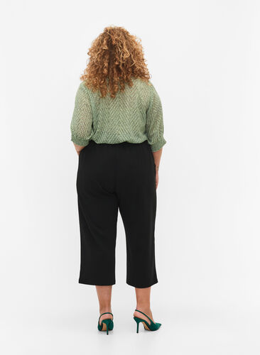 7/8 pants with loose fit, Black, Model image number 1