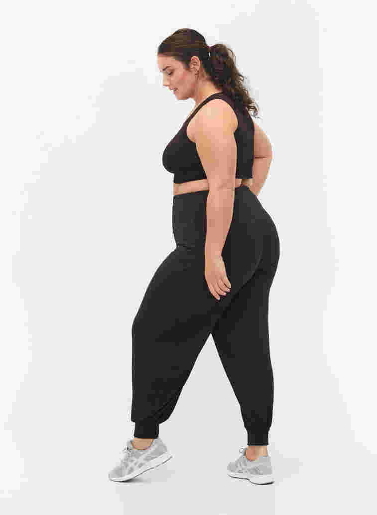 Loose jogging bottoms in viscose, Black, Model image number 1