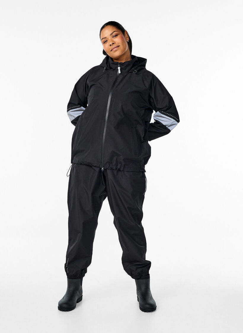 Rain jacket with reflective details, Black, Model image number 1