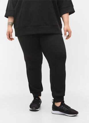 Loose joggers with pockets, Black, Model image number 2