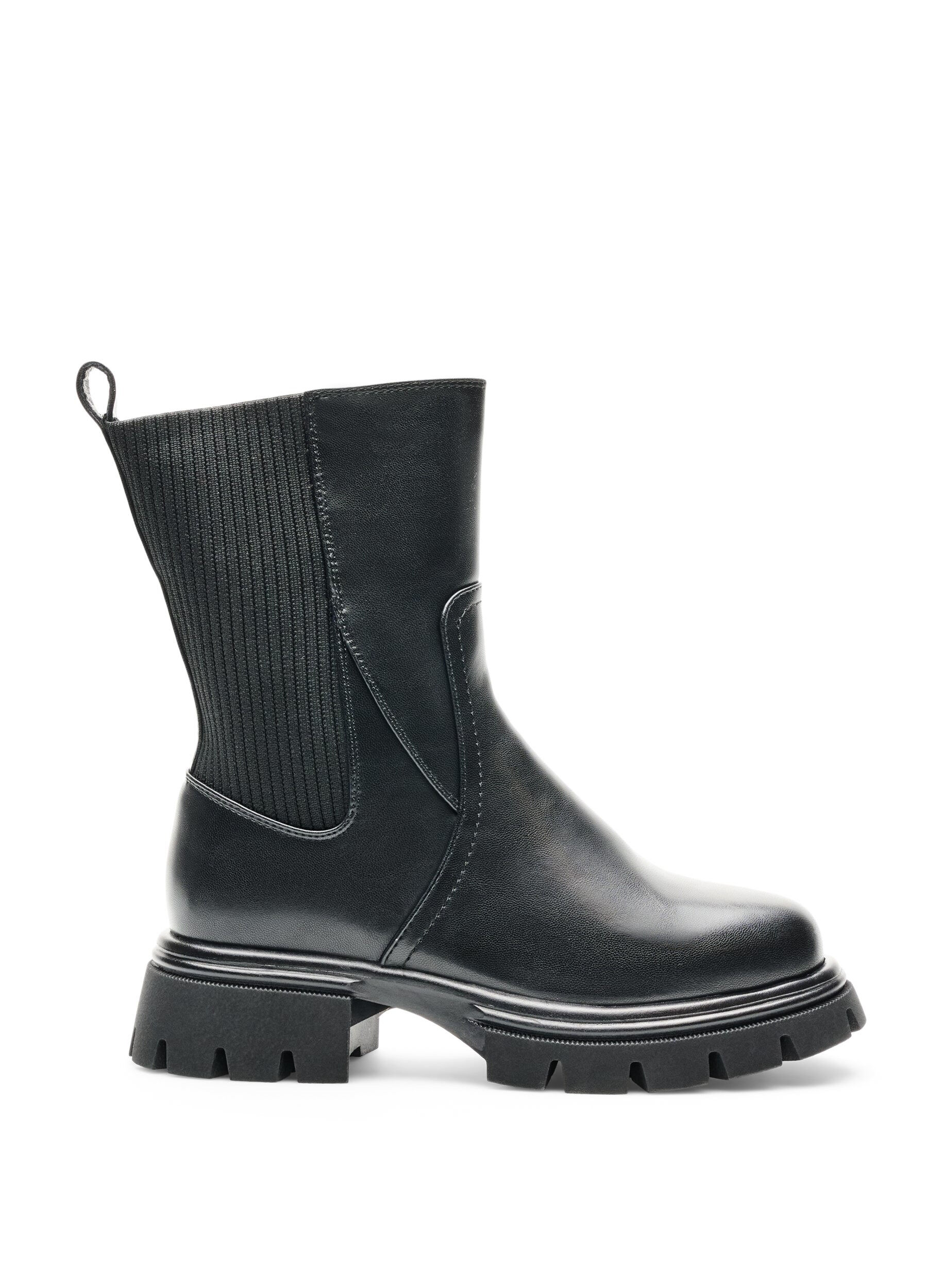 Chelsea boot with a chunky sole and ribbed panels