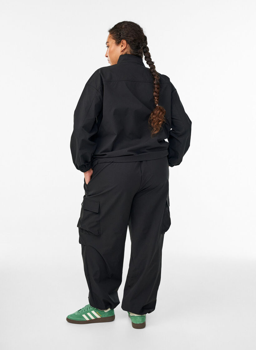 Trackpants with cargo pockets, Black, Model image number 1