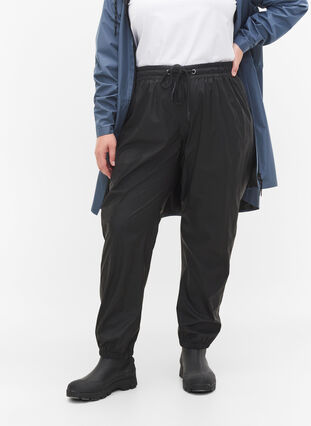Rain trousers with elastic and drawstring, Black, Model image number 2