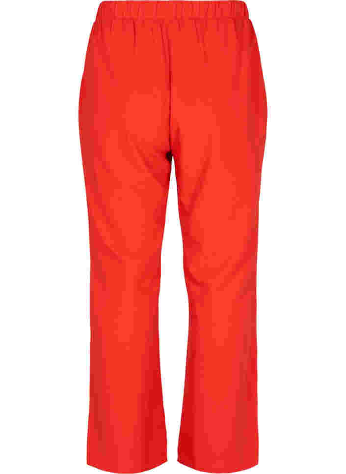 Flared trousers with pockets, Fiery Red, Packshot image number 1