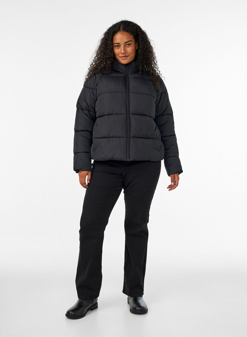 Short puffer jacket with a high collar, Black, Model image number 1