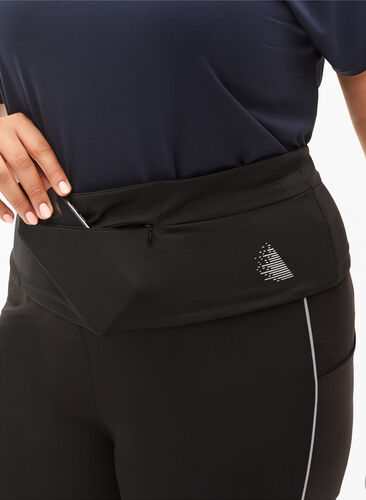 Running belt with zipped pockets, Black, Model image number 1