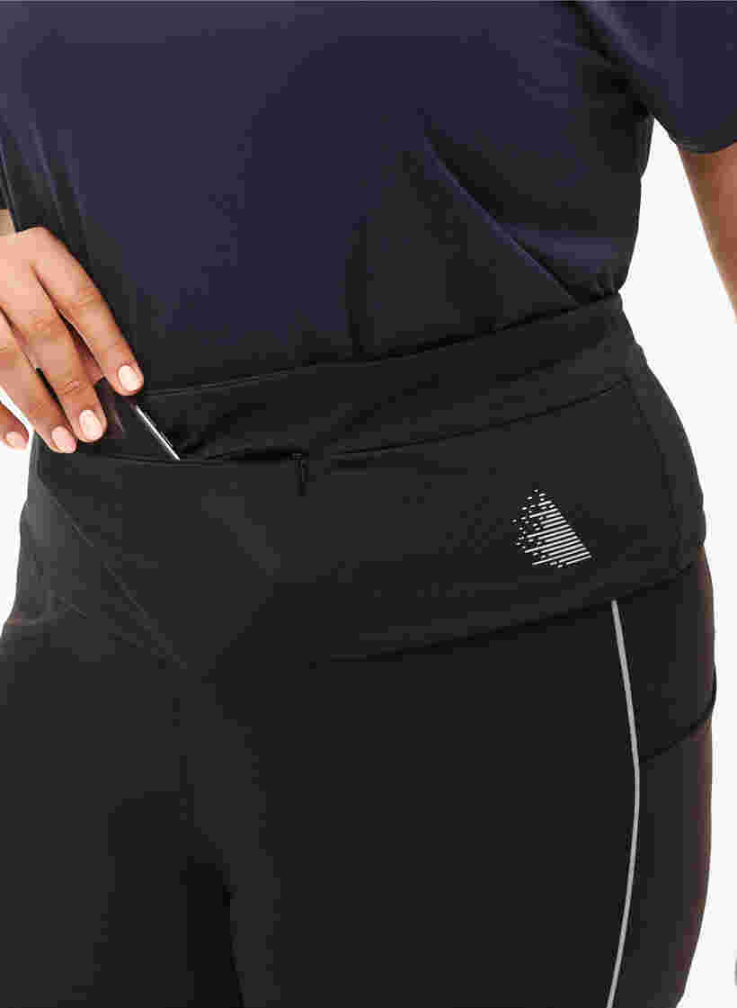 Running belt with zipped pockets, Black, Model image number 1