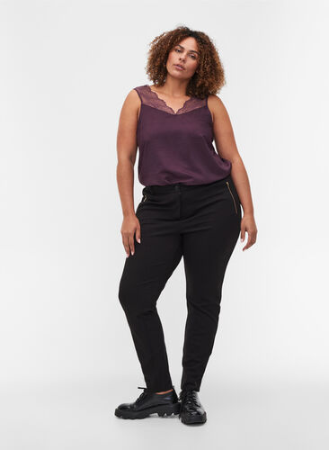 Tight-fitting trousers with pockets and a zipper, Black, Model image number 0