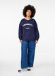 Sweatshirt with embossed text design, Blue, Model image number 1