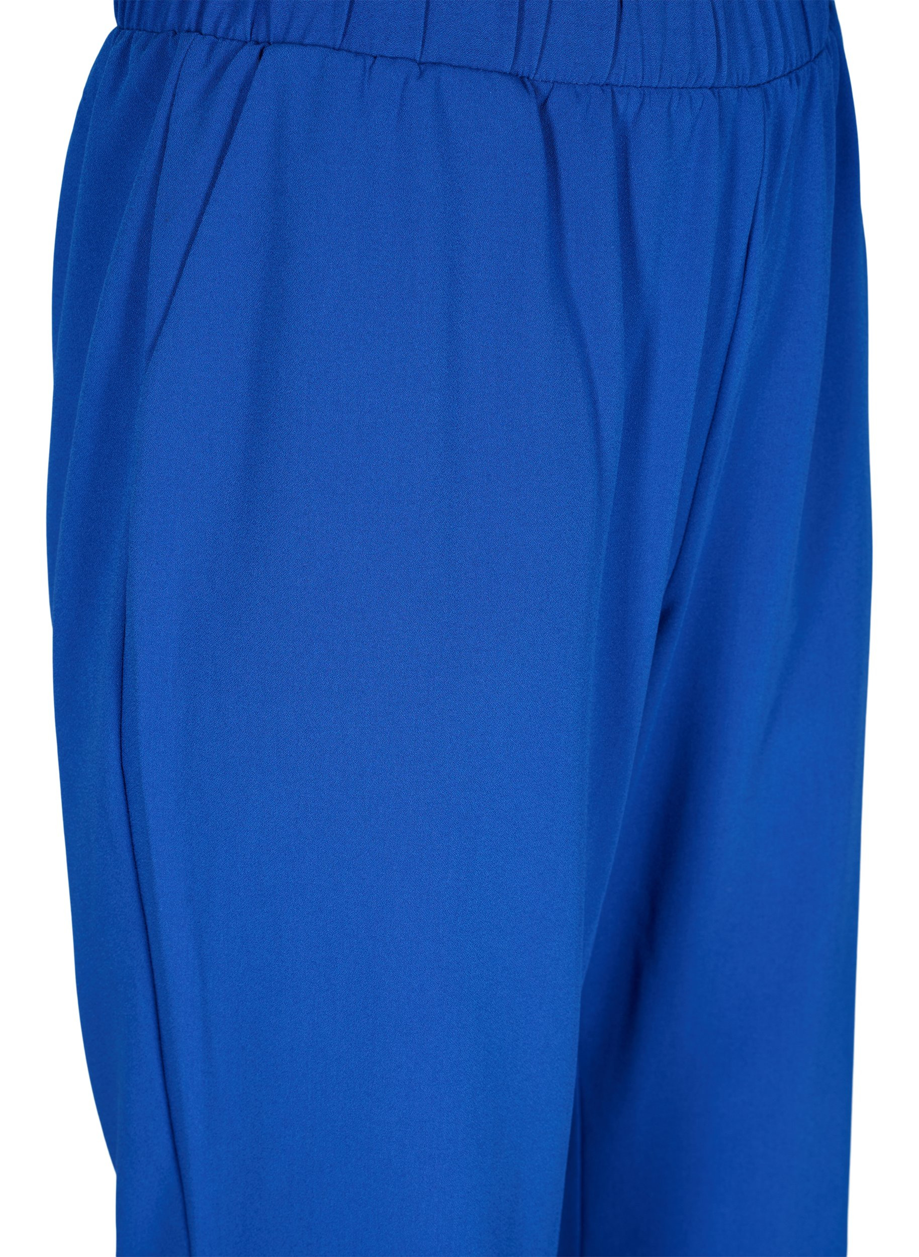 Flared trousers with elasticated waist 