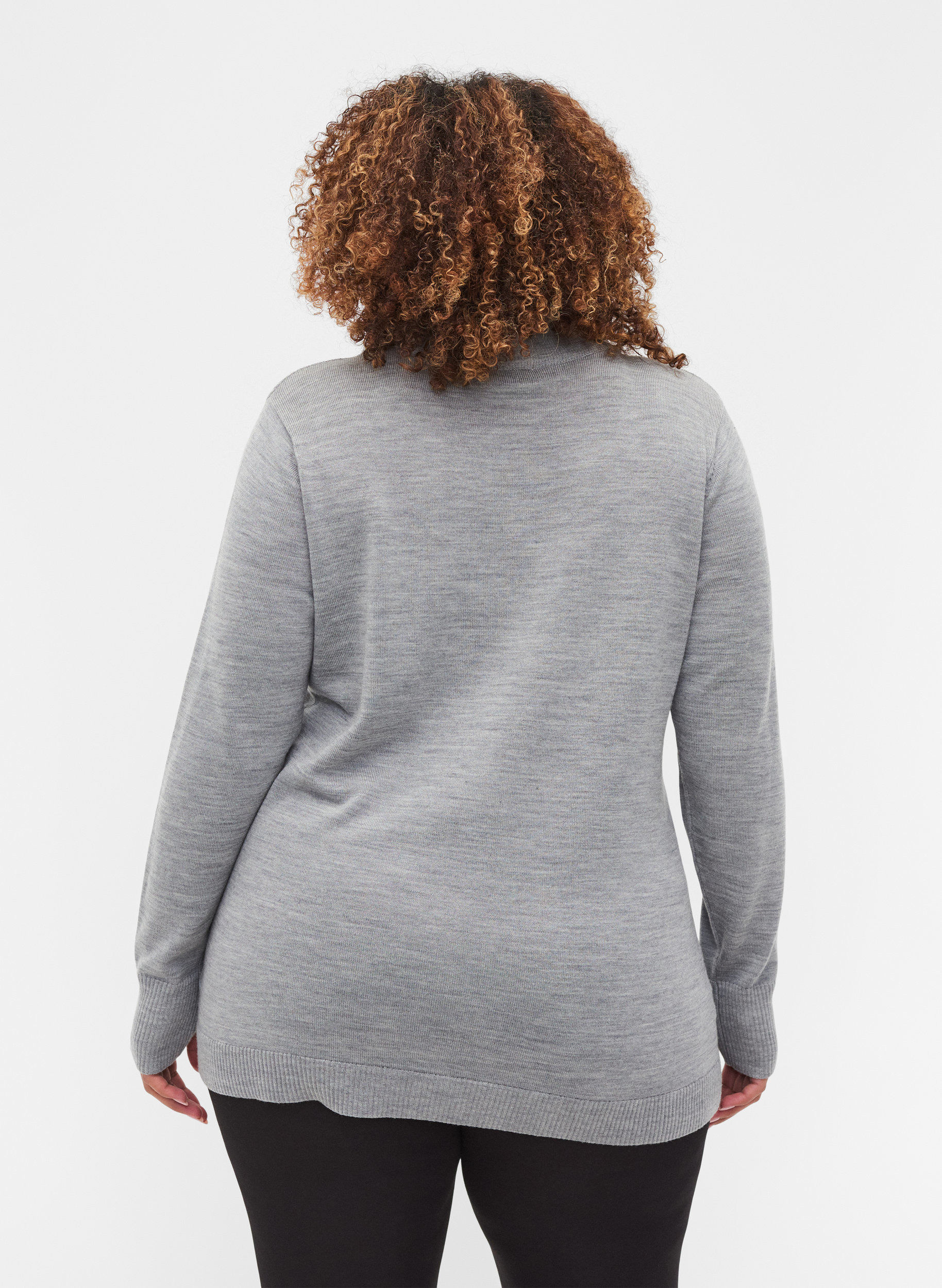 Wool knitted blouse with high collar 