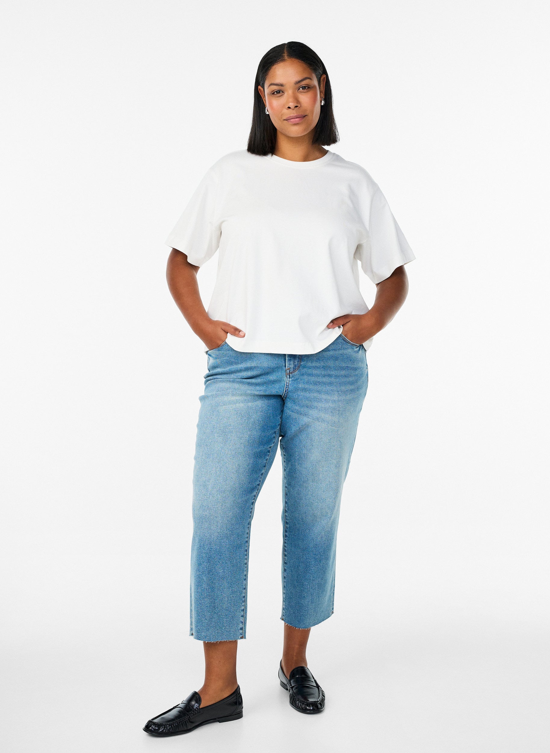 7/8 jeans with raw hems and high waist 