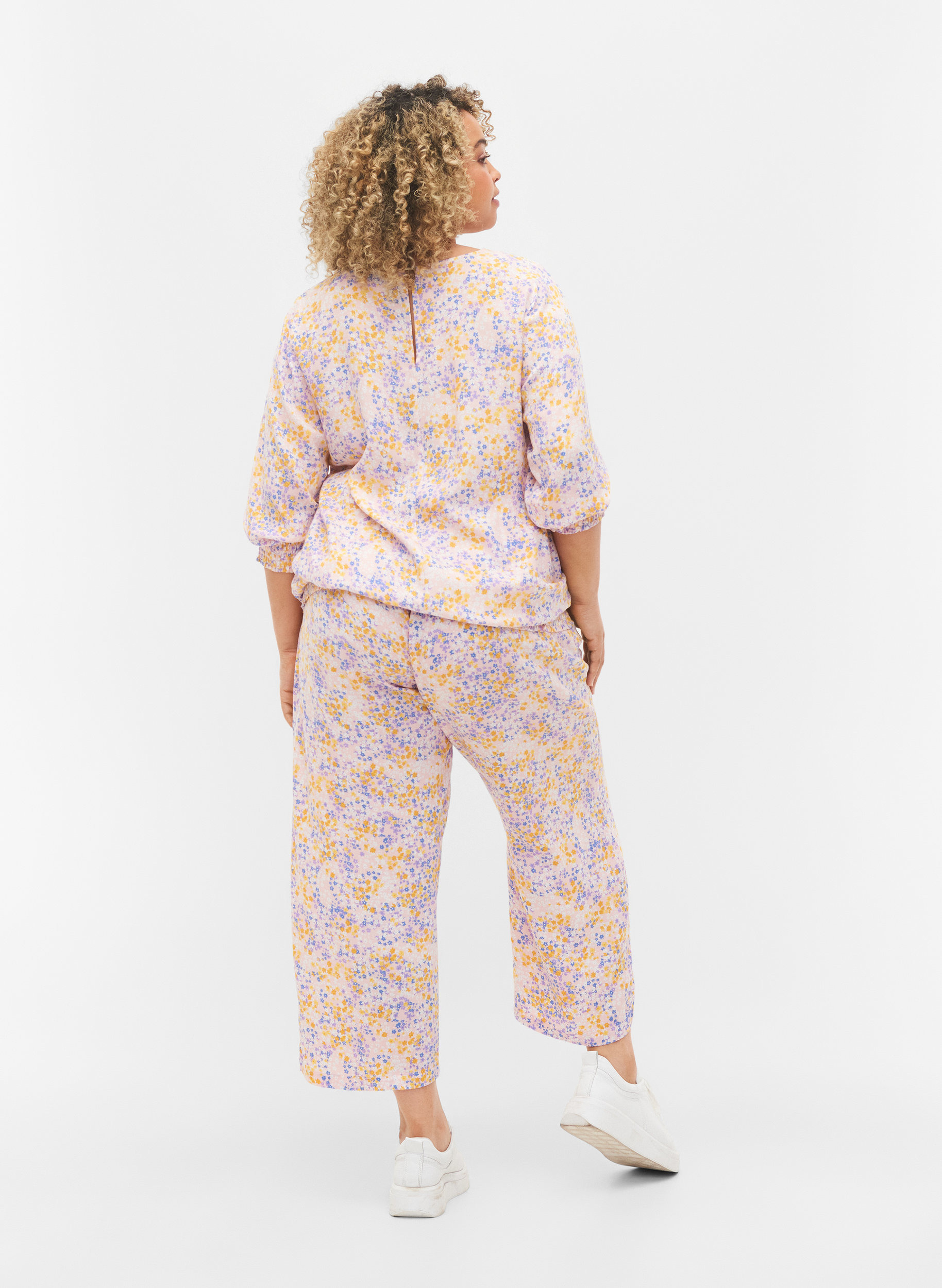 Cropped viscose trousers with floral 