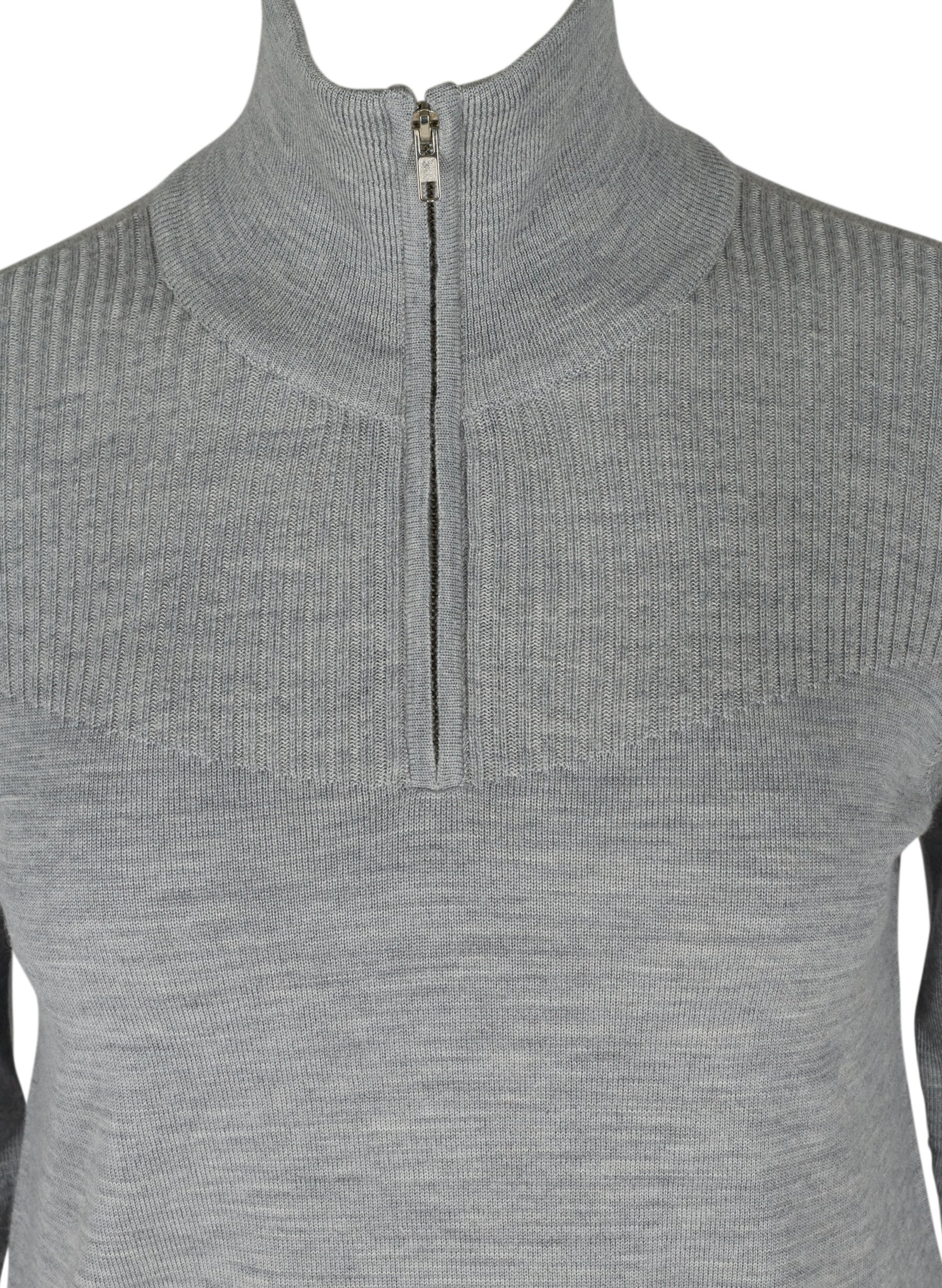 Wool knitted blouse with high collar 